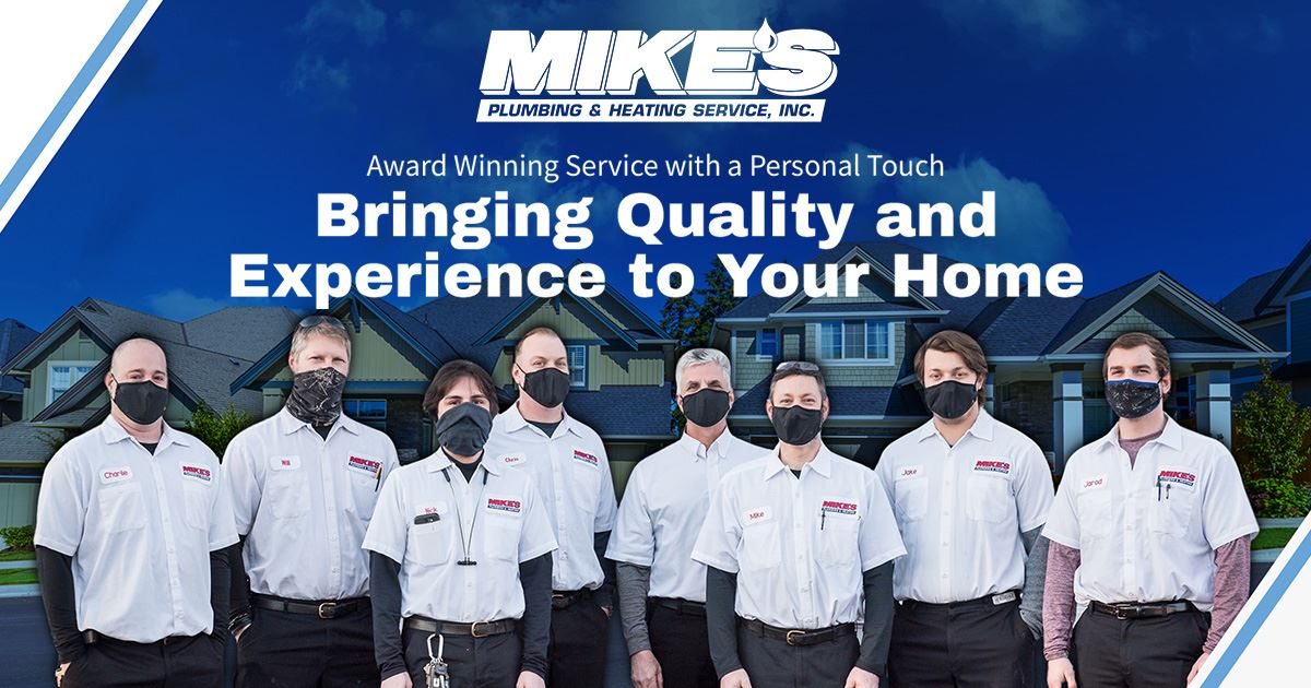Mike's Plumbing Services drain and sewer cleaning team