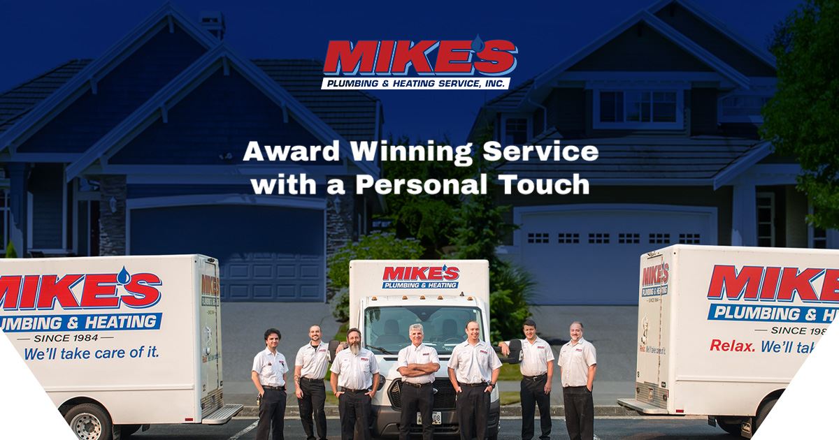 Mike's Plumbing Services drain and sewer cleaning team